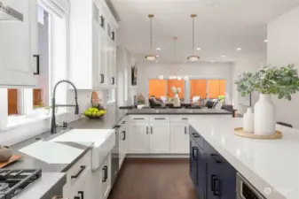 Kitchen has extensive quartz counters and tons of cabinets making cooking easy!