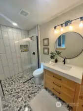 Primary bath with no-step shower entry.