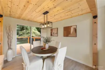 Dining area and deck for BBQ.