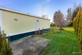 Patio off of laundry/utility and kitchen