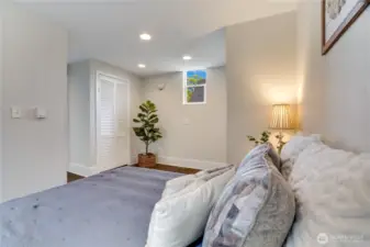 In addition to its generous size, this bedroom offers extra space for a dresser or a desk—perfect for storage, work-from-home setups, or a cozy reading nook