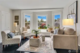 Curl up with your morning coffee and a good book as you enjoy the views of this amenity-rich neighborhood. To the left is a great storage closet which is hard to find in multi-living units!