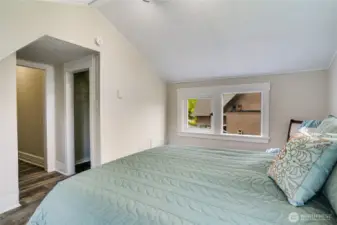 This bedroom has two closets suitable for the most expansive wardrobe.