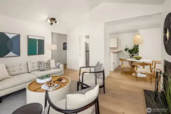View to the entryway and kitchen/dining areas.