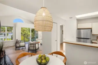 The whole living/dining area is light and bright.