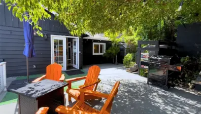 Deck side of the house which shows the side door entrance