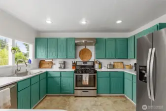 Bright kitchen offers plenty of storage and cooking space