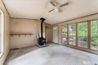 Living room with woodstove.
