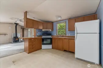 Another angle of kitchen and living room.
