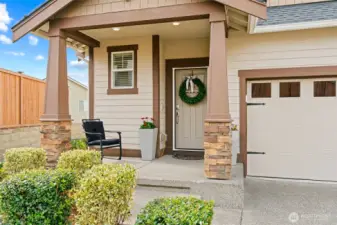 Welcoming front porch with sitting area