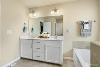 Primary bathroom offers a double vanity