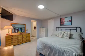 Primary bedroom with plenty of room for a bunk bed for a vacation home.