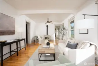 Through the living room is the kitchen.