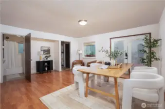 From the dining space you can enter the second bathroom without going through the second bedroom.