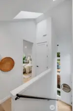 Upper floor top of stairs facing Primary bedroom.