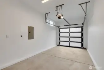 One car garage with EV charging.