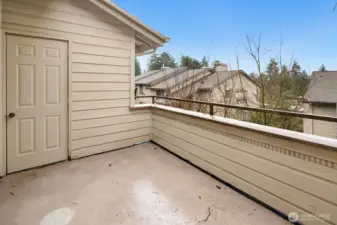 Balcony with storage closet.