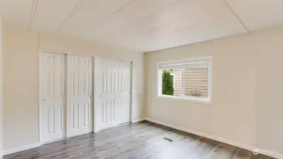 View of triple closets in Master Bedroom.