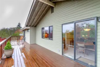 The back deck goes across the full length of the house.