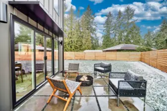 Entertainment patio off kitchen offers al fresco living with a fully fenced backyard on this 3,800 sq ft lot.