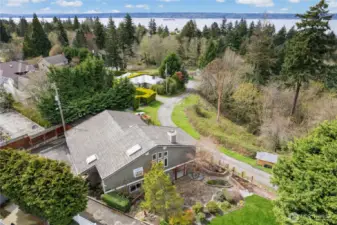 Sited next to a green belt between a circular driveway entrance and a private lane, this property is a special find. Peaceful and private with a wonderful connection to nature.