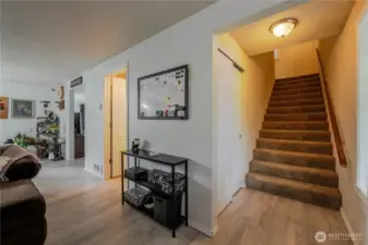 View from front door to Stairwell, Full Bathroom and Doorway to the Recreation Room