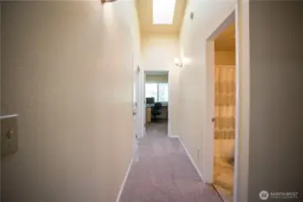 Skylights and vaulted ceilings amplify the space.