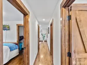 Rustic Wood Trim and Doors Throughout