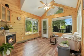 Vaulted ceiling in living room, fireplace, built ins and loft above!