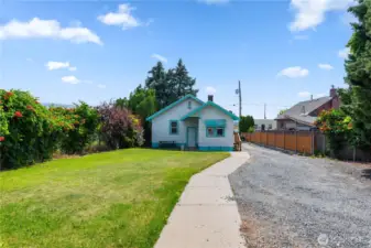 Back entrance with plenty of yard space and parking space