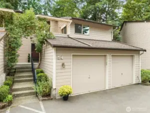 End-unit townhome with 2-car garage and private entry. Nestled in the trees of Forestbrook, this home combines convenience with a warm and welcoming setting.