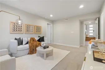 A flexible lower level offers a 4th bedroom, bonus room, and ¾ bath, perfect for guests or multi-generational living.