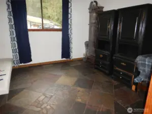 Slate floors in one of the bedrooms