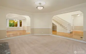 Pass through living room to formal dining room and kitchen allows an open concept type feel.