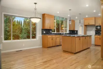 Cozy eat in area in kitchen perfect for a table and chairs with direct acces outside.