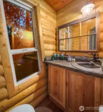 .75 bath in the tree house with rustic touches.