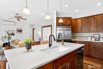 kitchen island with sink and storage.