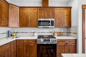View of new appliances; plenty of counter and storage space.