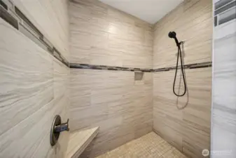 Beautiful tile shower in owner's en-suite bathroom.