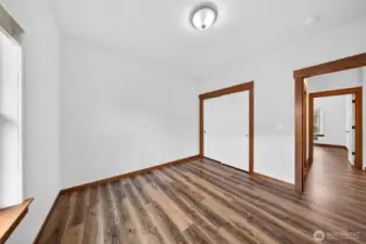 View of second bedroom with double door closet.