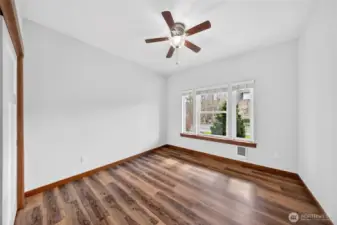3rd bedroom with new flooring and full closet.