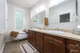 Primary bath with free standing tub, double sinks and shower.