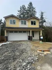 Subject property under construction. Long driveway for extra parking.    Estimated completion May.