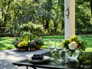 Peaceful backyard with sprinkler system