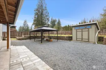 Spacious Back Yard with Tool Shed and Gazebo