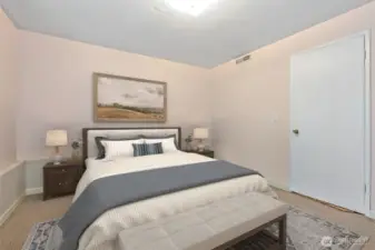 lower level bedroom. (virtually staged)