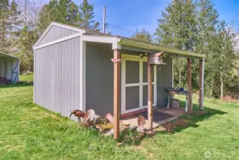 His/her/they shed in the back yard, large enough for tools and hobbies