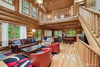 Upstairs has a loft, another deck, 2 bedrooms and a bathroom.