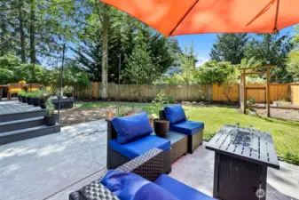 The Trex composite deck is adjacent to the stamped concrete patio.