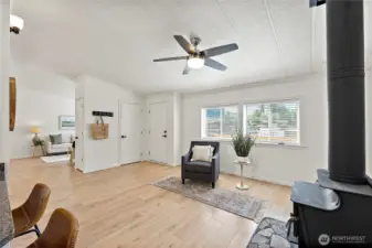 OPEN CONCEPT GREATROOM WITH WOOD STOVE